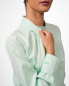 Preview: VIP Bluse mit Kragendetail – Stil trifft Schutz - Mintgrün